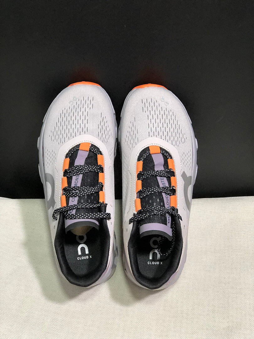 On Cloudmonster Sneakers in Foggy White and Orange