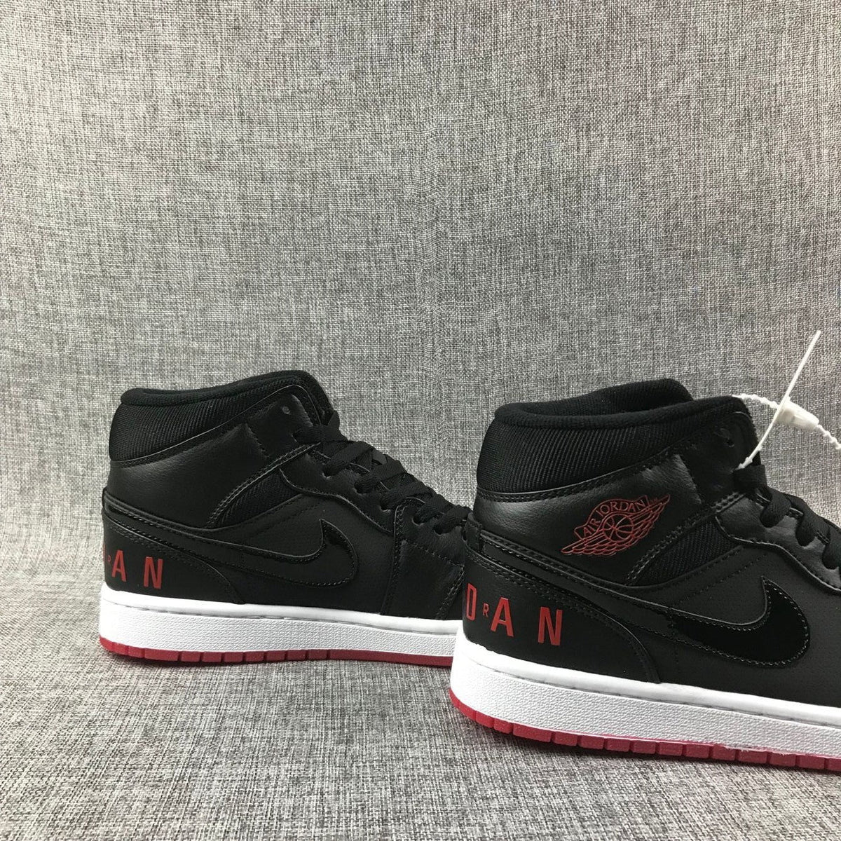 Air Jordan 1 Mid Black Red White High-Top Sneakers