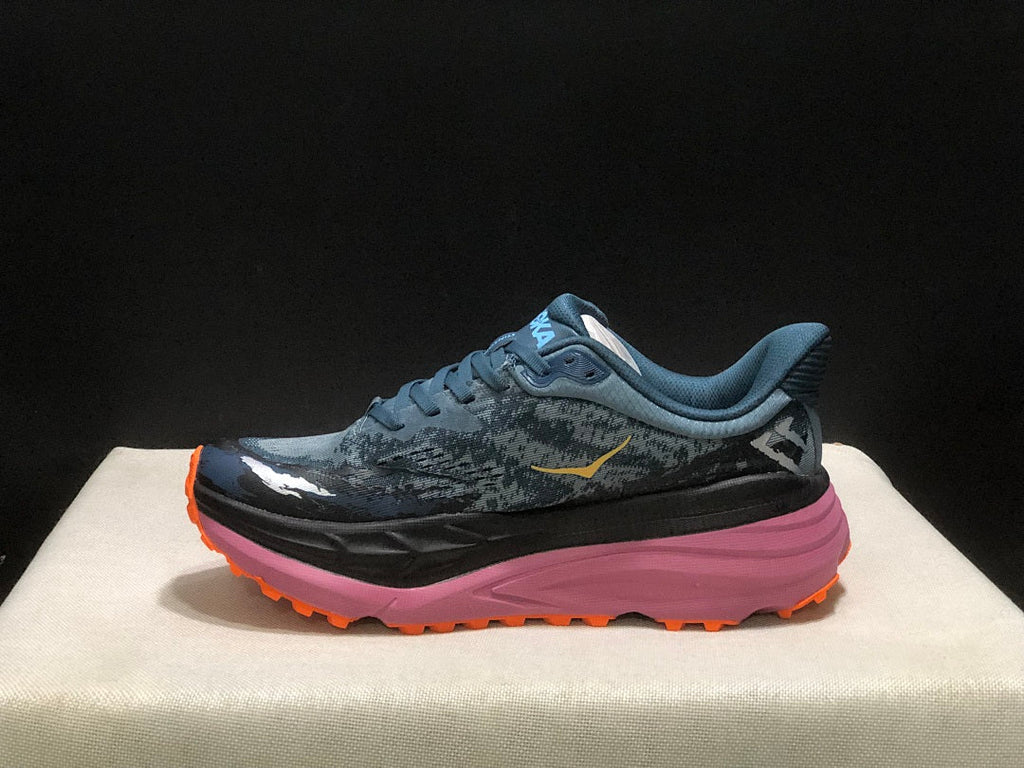 HOKA Stinson 7 Trail Running Shoes in Blue and Orange