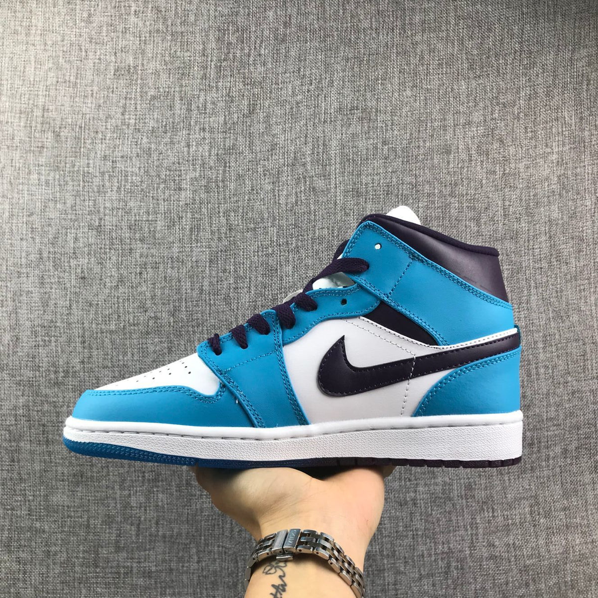 Air Jordan 1 Mid Sneakers in Blue, White and Black