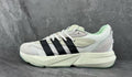 Adidas Lightstrike Low-Top Sneakers in White and Black