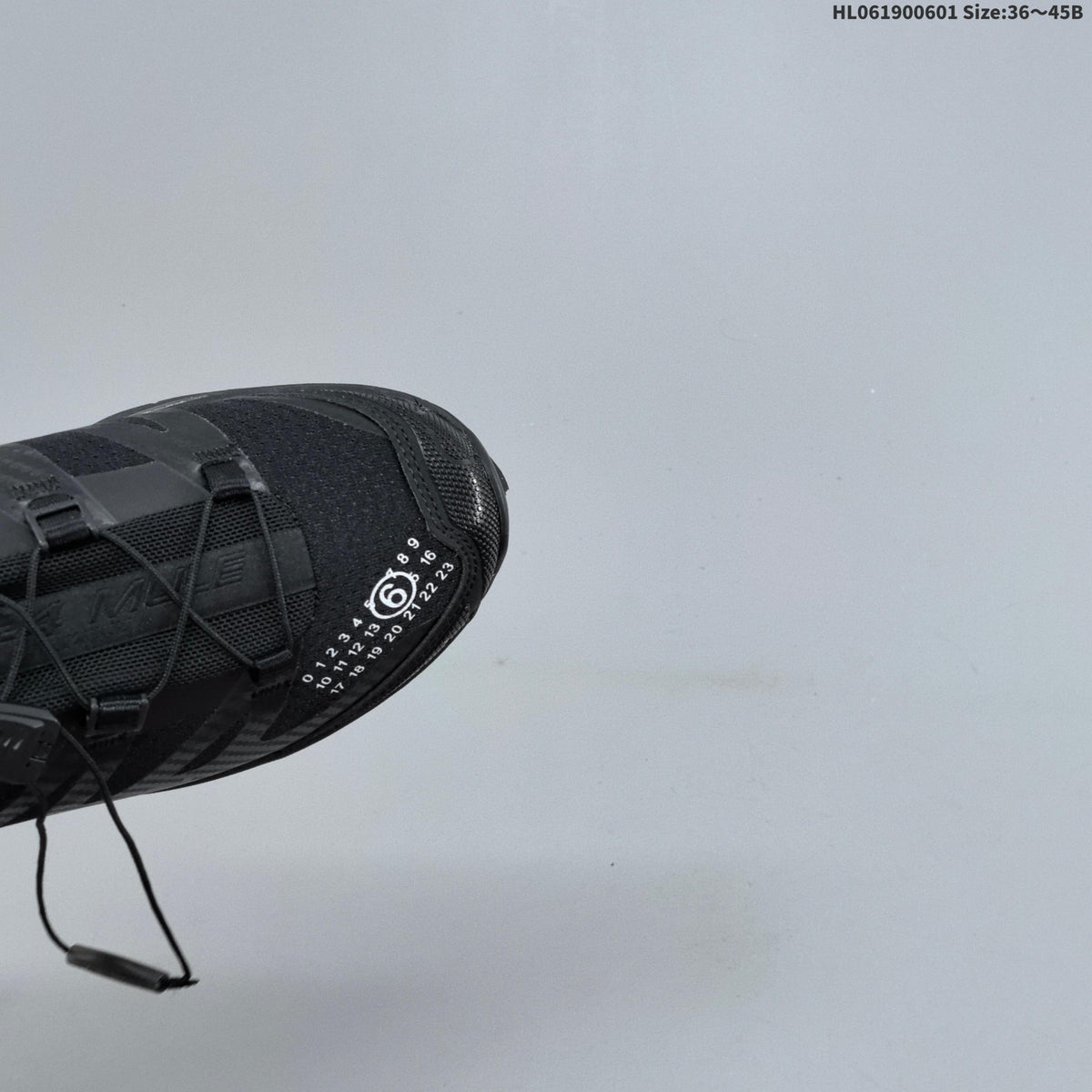 Salomon XT-4 Mule Sneakers in Black and Silver