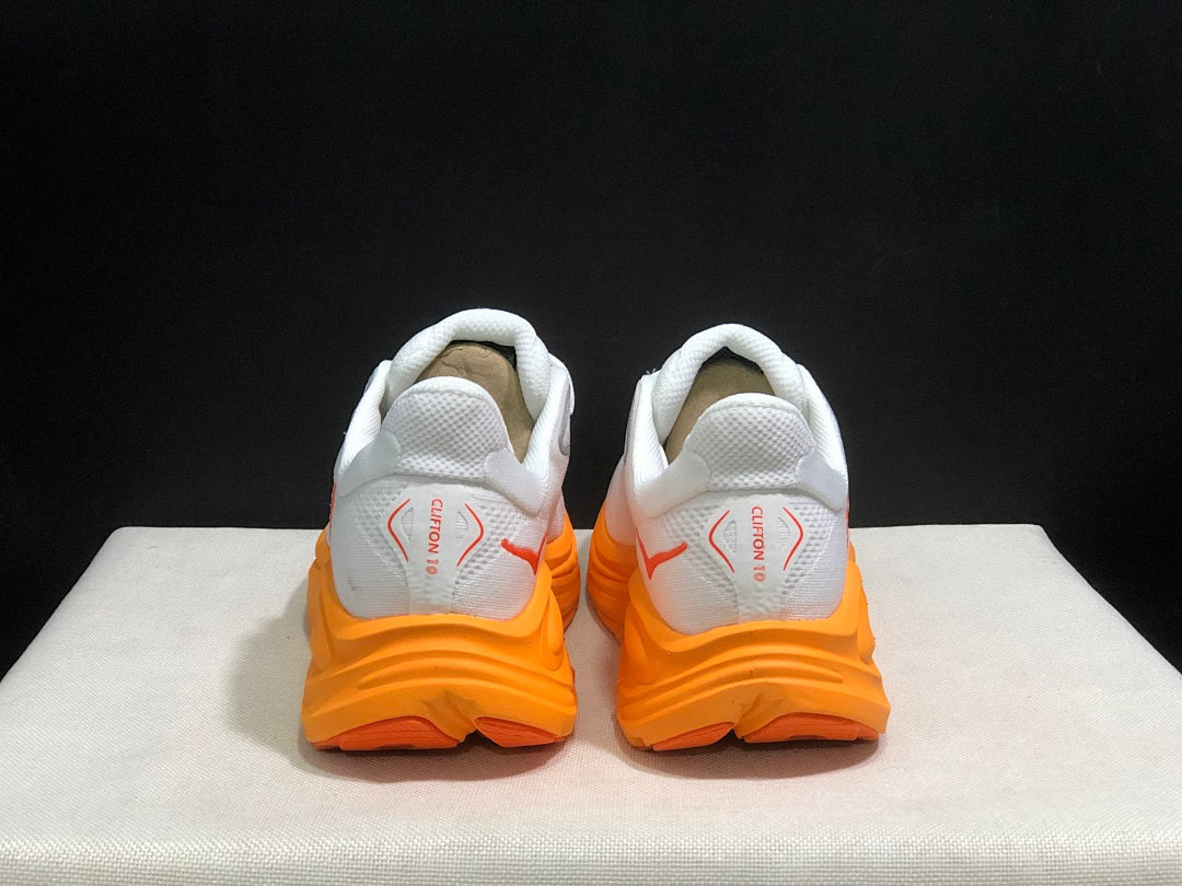 HOKA Clifton 10 Running Shoes in White and Orange
