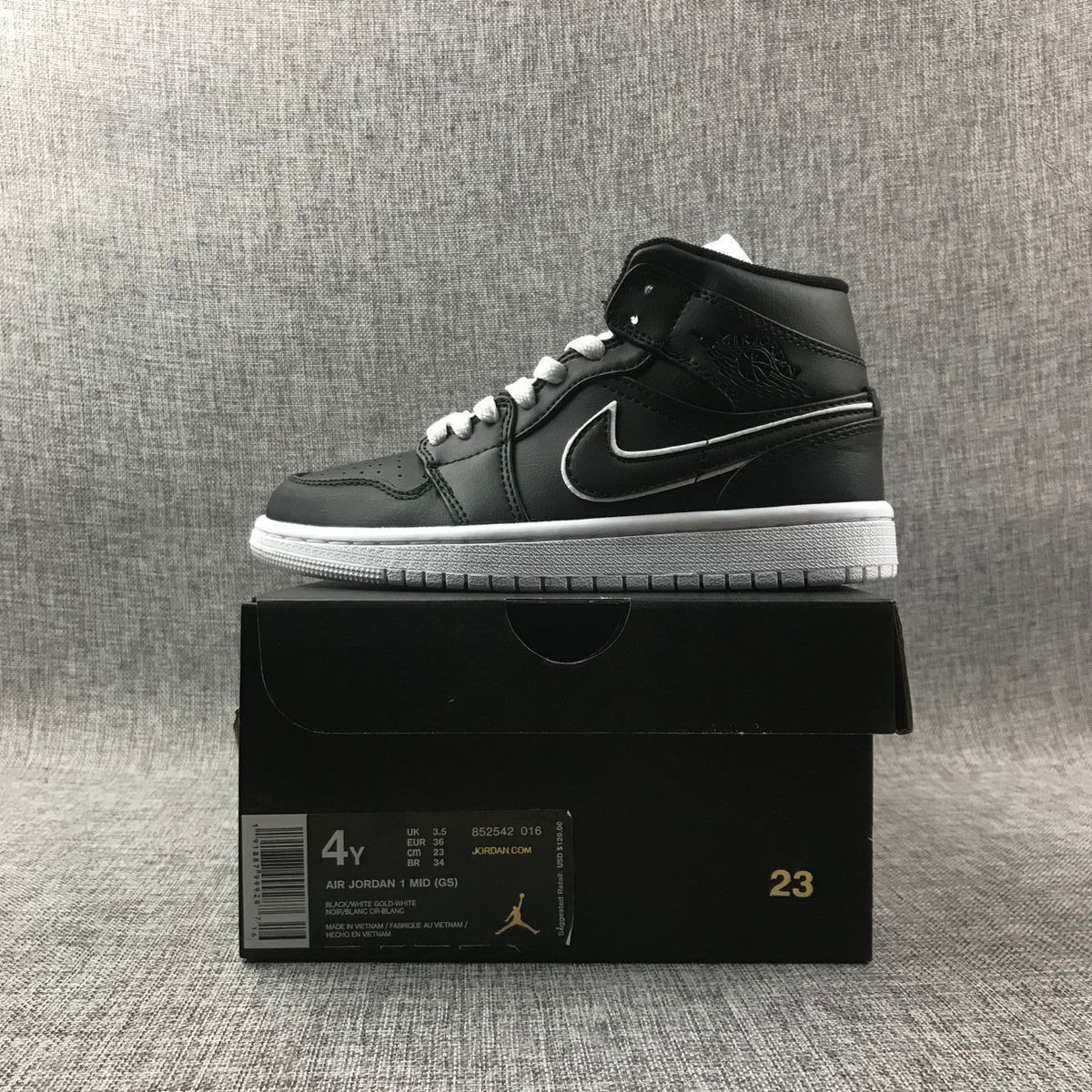 Air Jordan 1 Mid Black and White Sneakers 852542-016