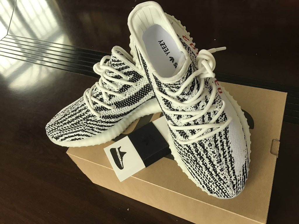 Yeezy 350 V2 Glow-in-the-Dark Sneakers, Black and White