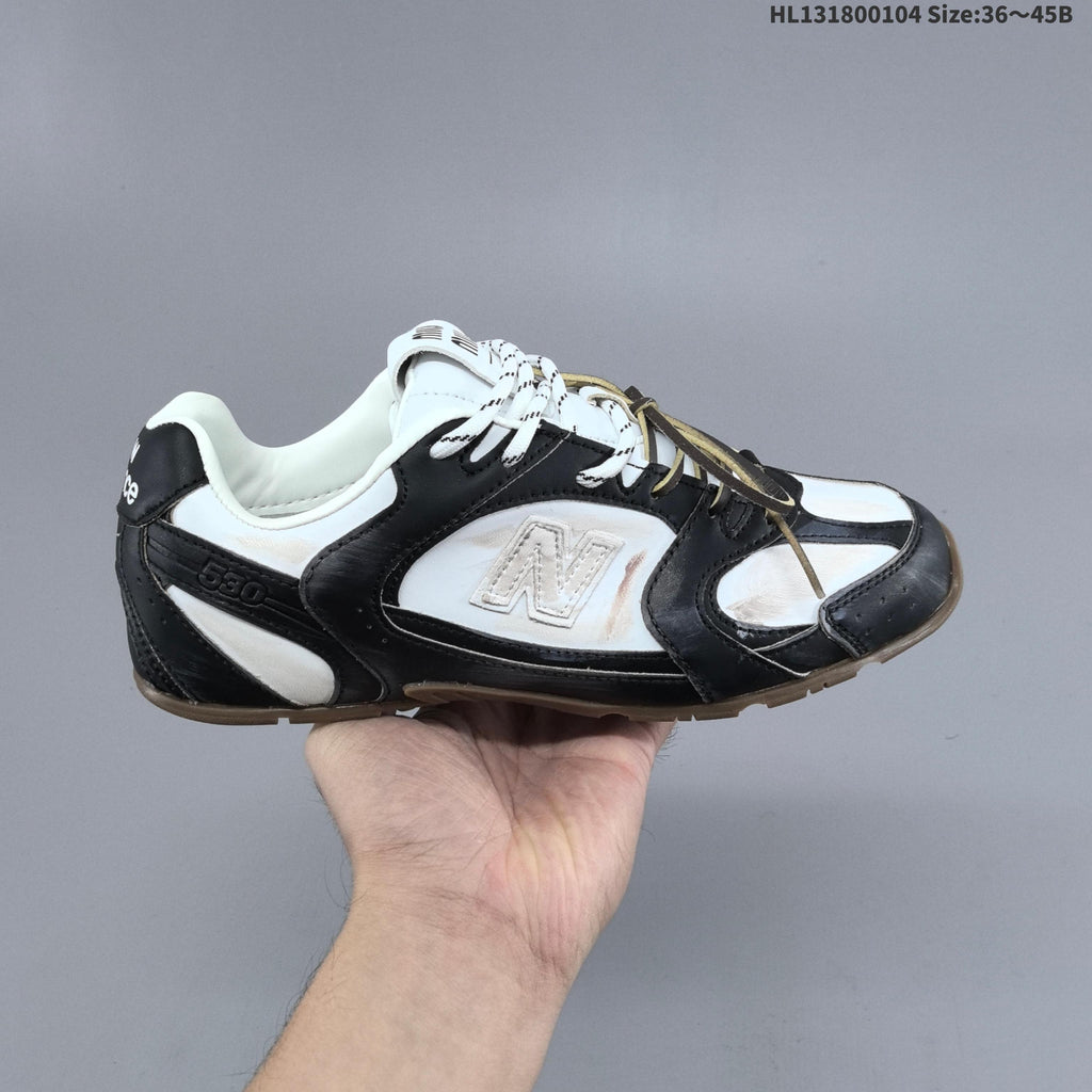 New Balance 530 SL Low-Top Sneakers in Black and White
