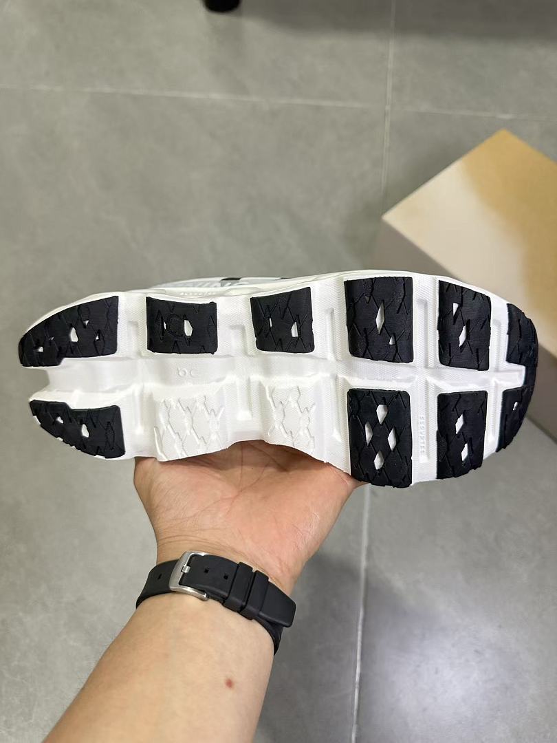 On Running White and Black Running Shoes