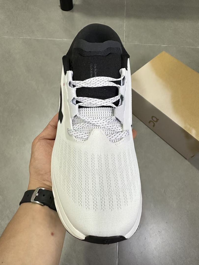 On Running White and Black Running Shoes