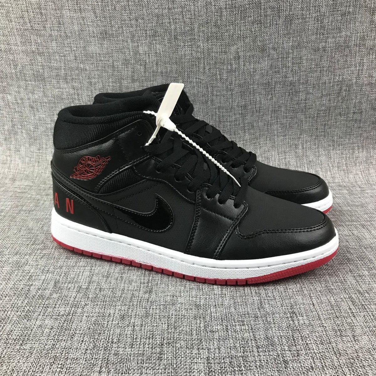 Air Jordan 1 Mid Black Red White High-Top Sneakers