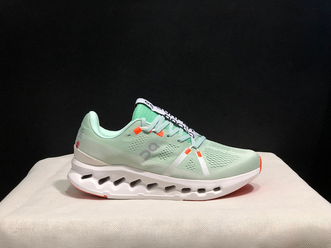 On Cloudsurfer Sneakers in Pale Green and White
