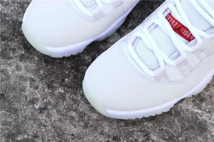 Jordan Air Jordan 11 Platinum Tint White High-Top Sneakers