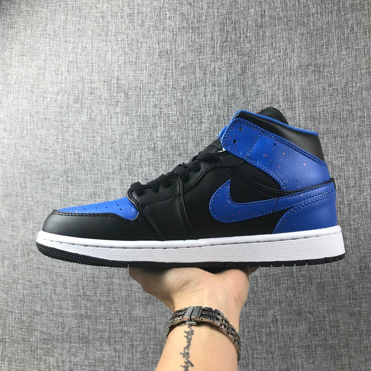 Air Jordan 1 Mid Black and Blue High-Top Sneakers