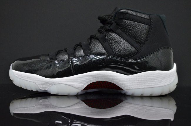 Air Jordan 11 Retro 72-10 Black and White High-Top Sneakers
