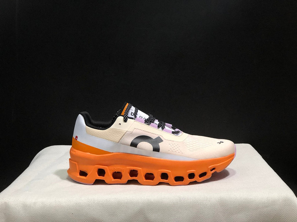 On Cloudmonster Running Shoes in Yellow Tan and Orange