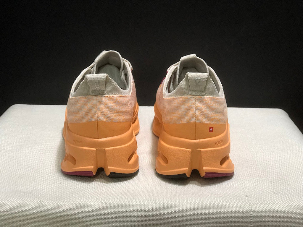 On Cloudsurfer Max Running Shoes in Pearl and Tangerine