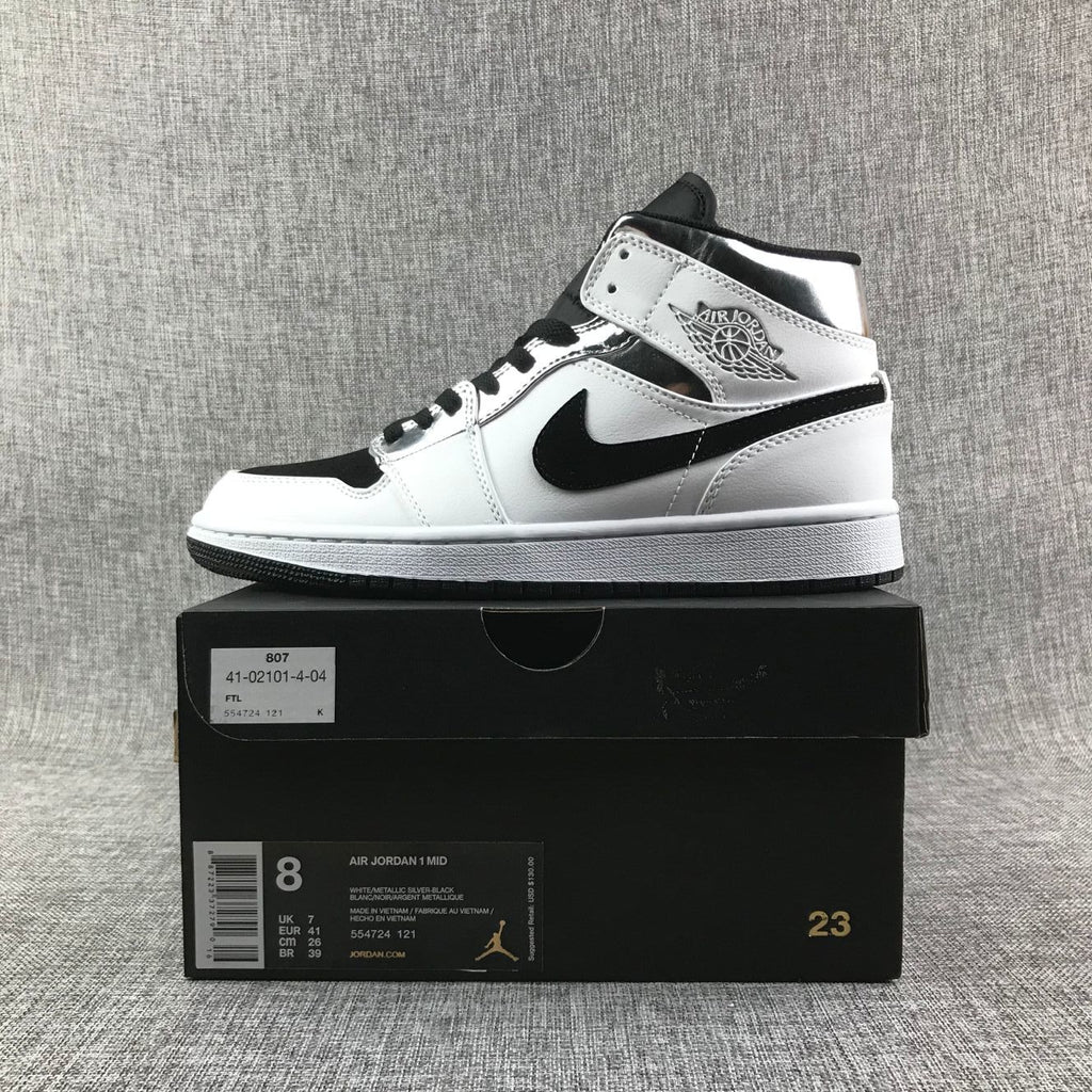 Air Jordan 1 Mid White and Black Sneakers