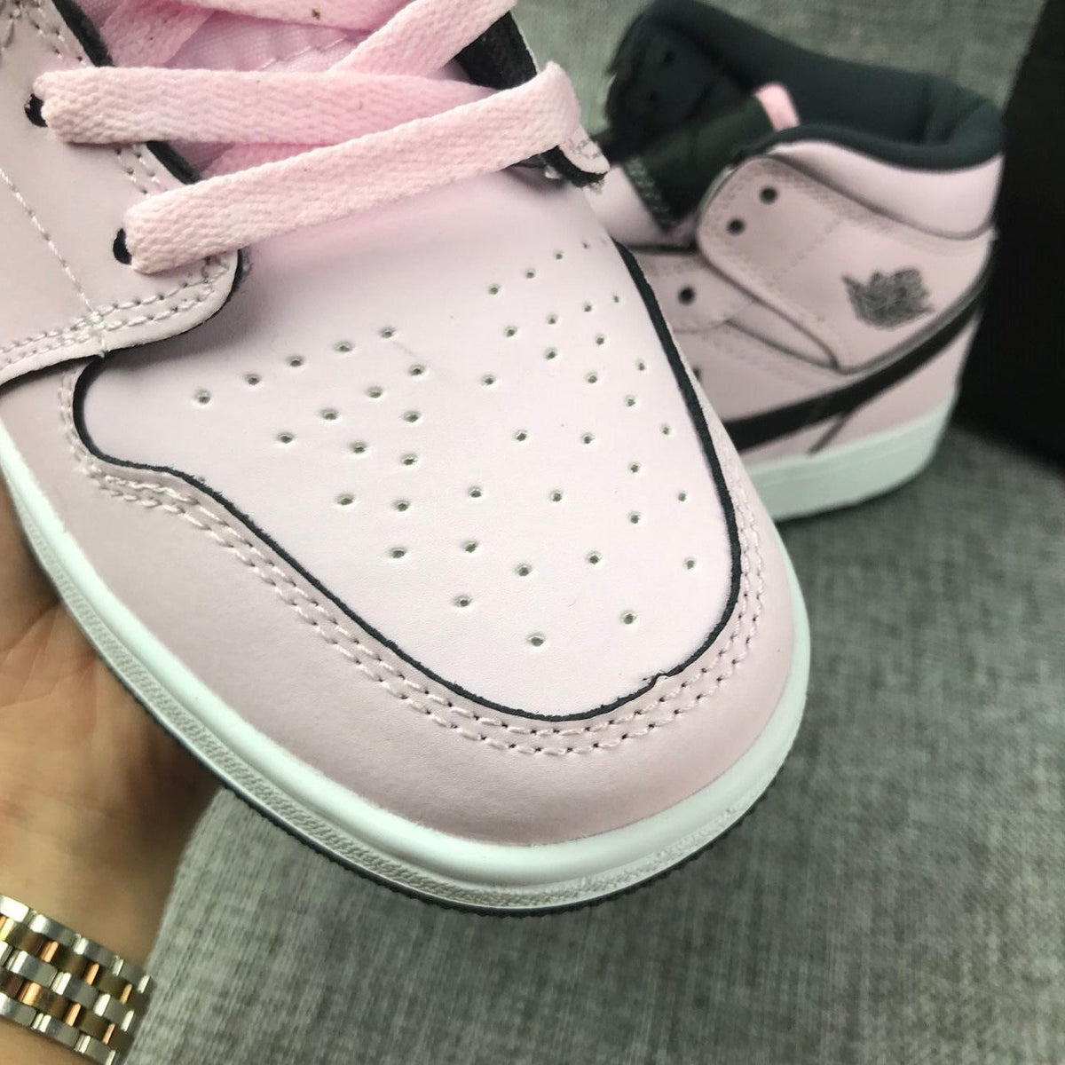 Air Jordan 1 Mid Pink and Black High-Top Sneakers