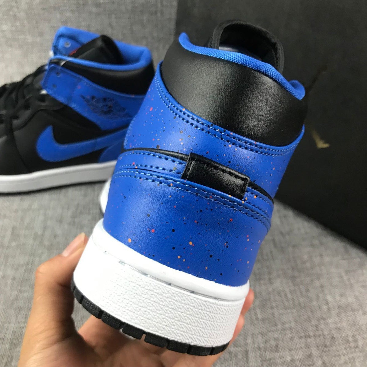 Air Jordan 1 Mid Black and Blue High-Top Sneakers