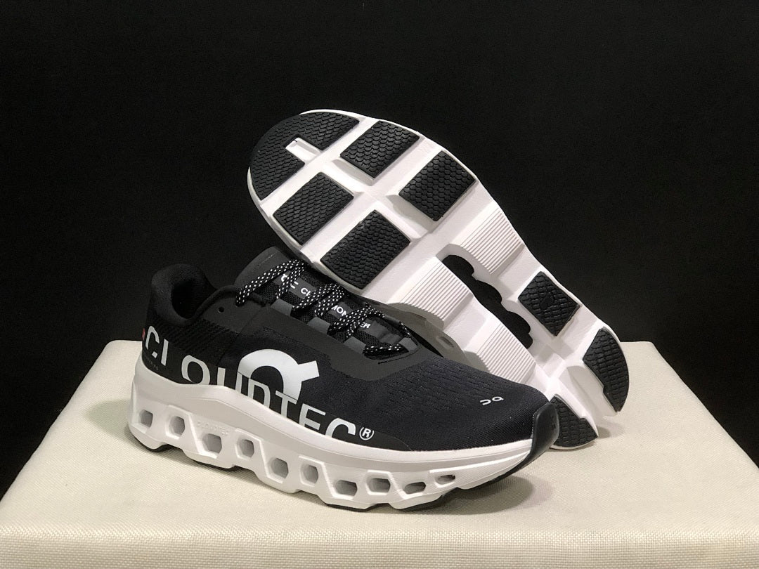 On Cloudmonster Black and White Running Sneakers