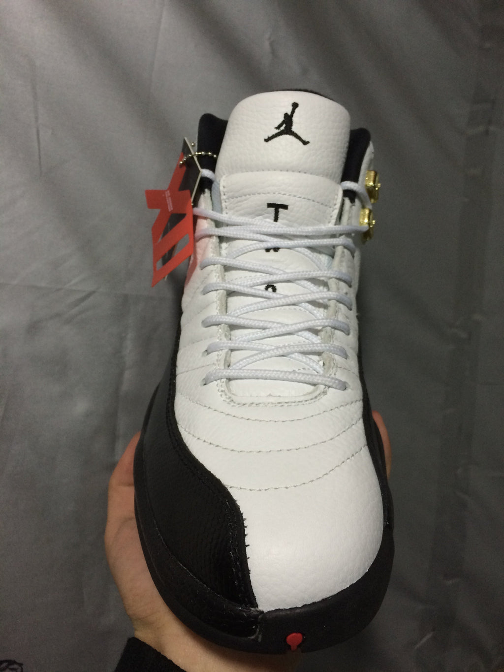 Jordan Air Jordan 12 Retro White and Black High-Top Sneakers