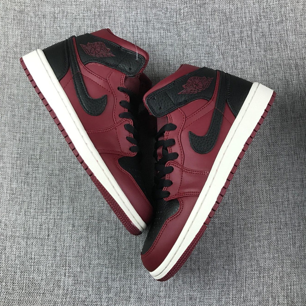 Air Jordan 1 Mid Burgundy and Black High-Top Sneakers