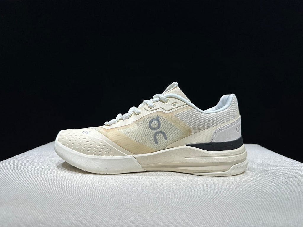 On The Roger Advantage Pro Sneakers in Cream and Black