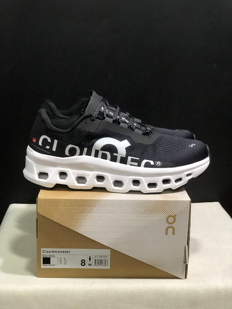 On Cloudmonster Black and White Running Sneakers