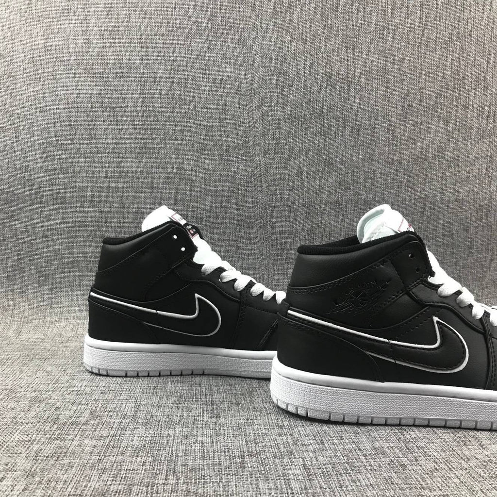 Air Jordan 1 Mid Black and White Sneakers 852542-016