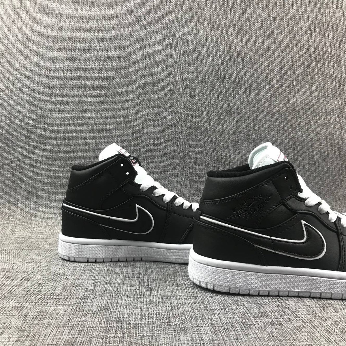 Air Jordan 1 Mid Black and White Sneakers 852542-016