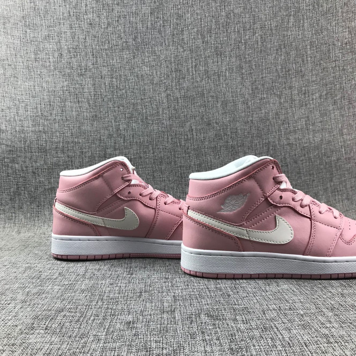 Jordan 1 Mid Pink Women’s Sneakers 555112-100
