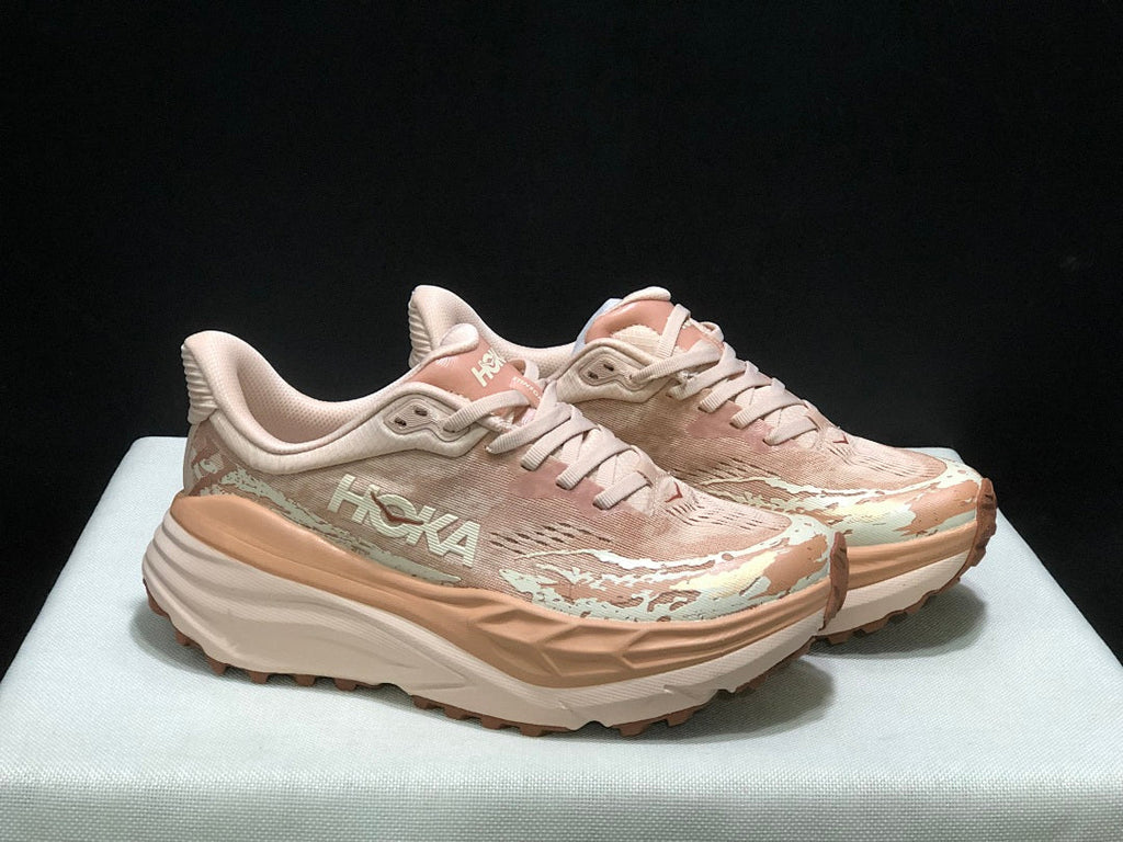 HOKA Stinson 7 Trail Running Shoes in Blush and Cream