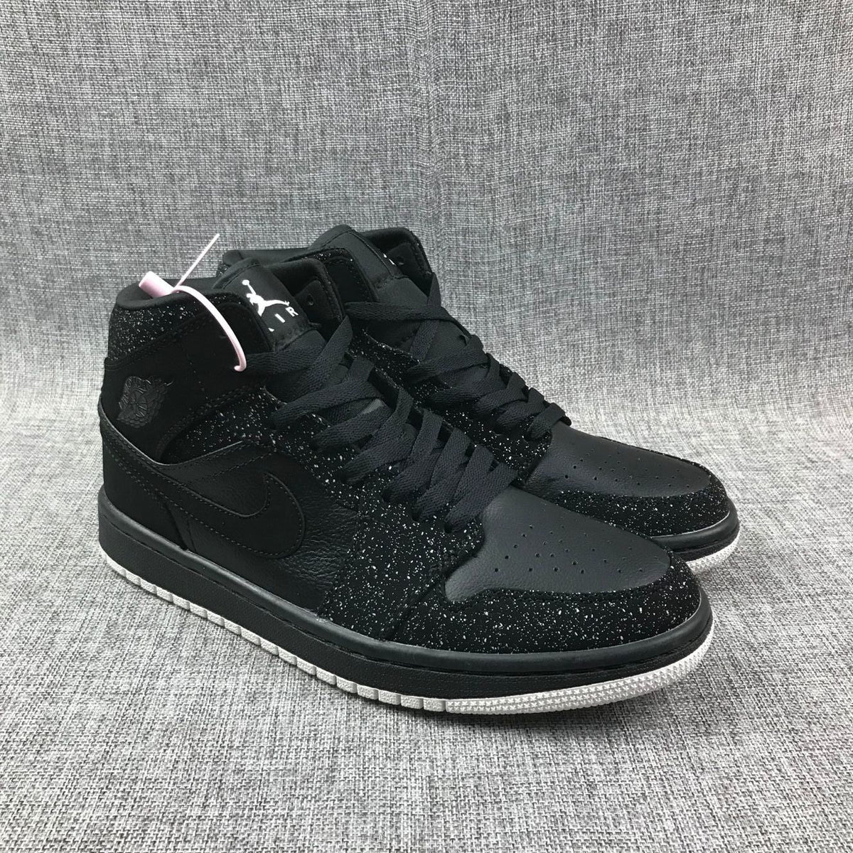 Jordan Air Jordan 1 Mid Black and White Sneakers 554724-001