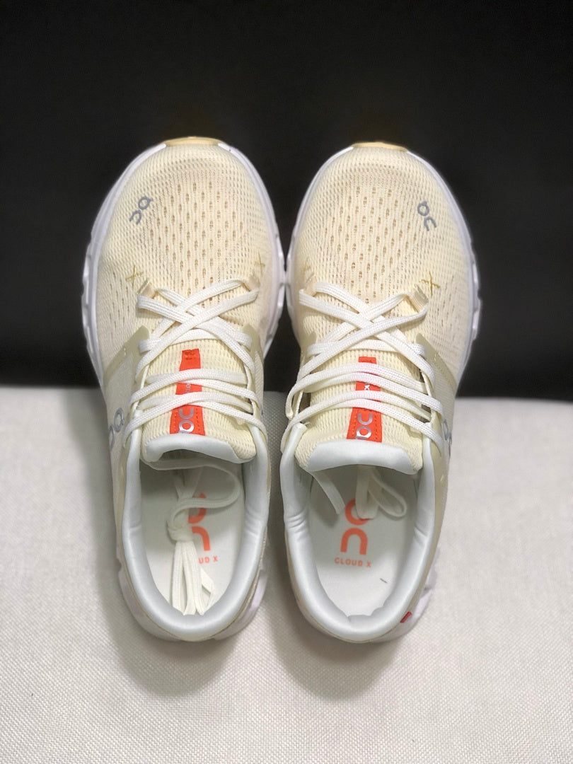 On Cloud X 4 Sneakers in Cream and Orange