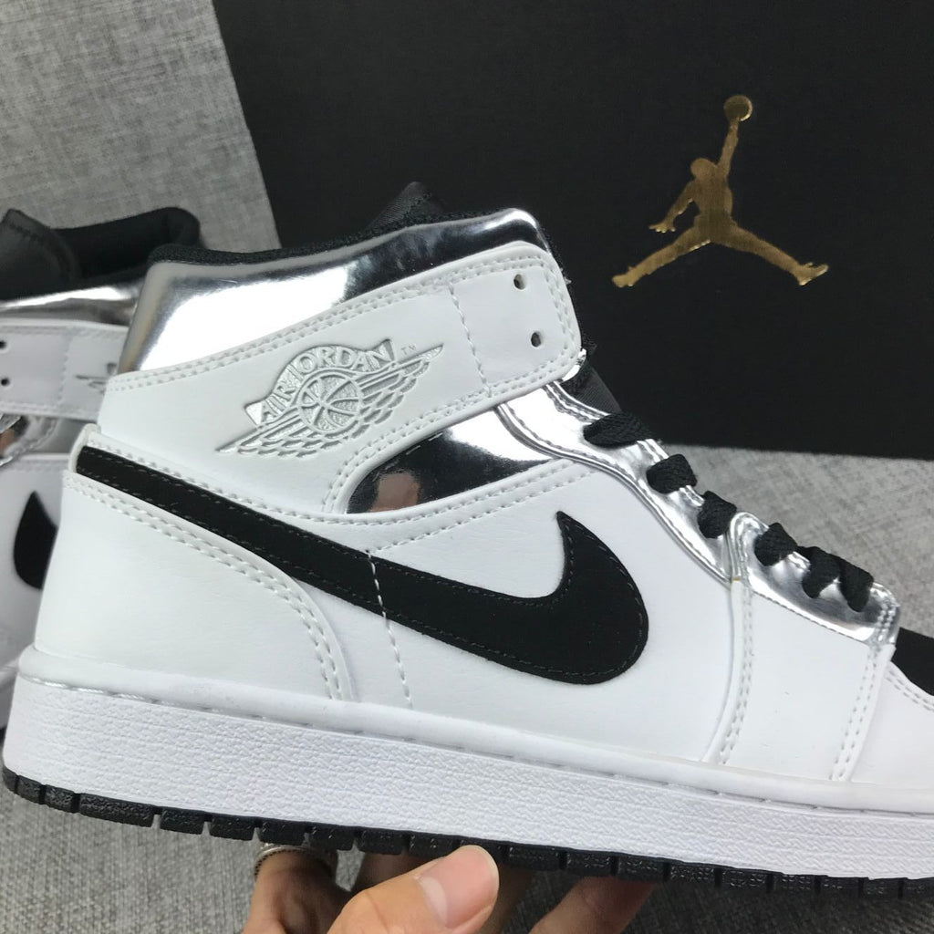 Air Jordan 1 Mid White and Black Sneakers