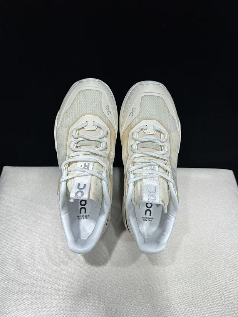 On The Roger Advantage Pro Sneakers in Cream and Black