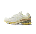 New Balance 2002R Sneakers in White and Yellow