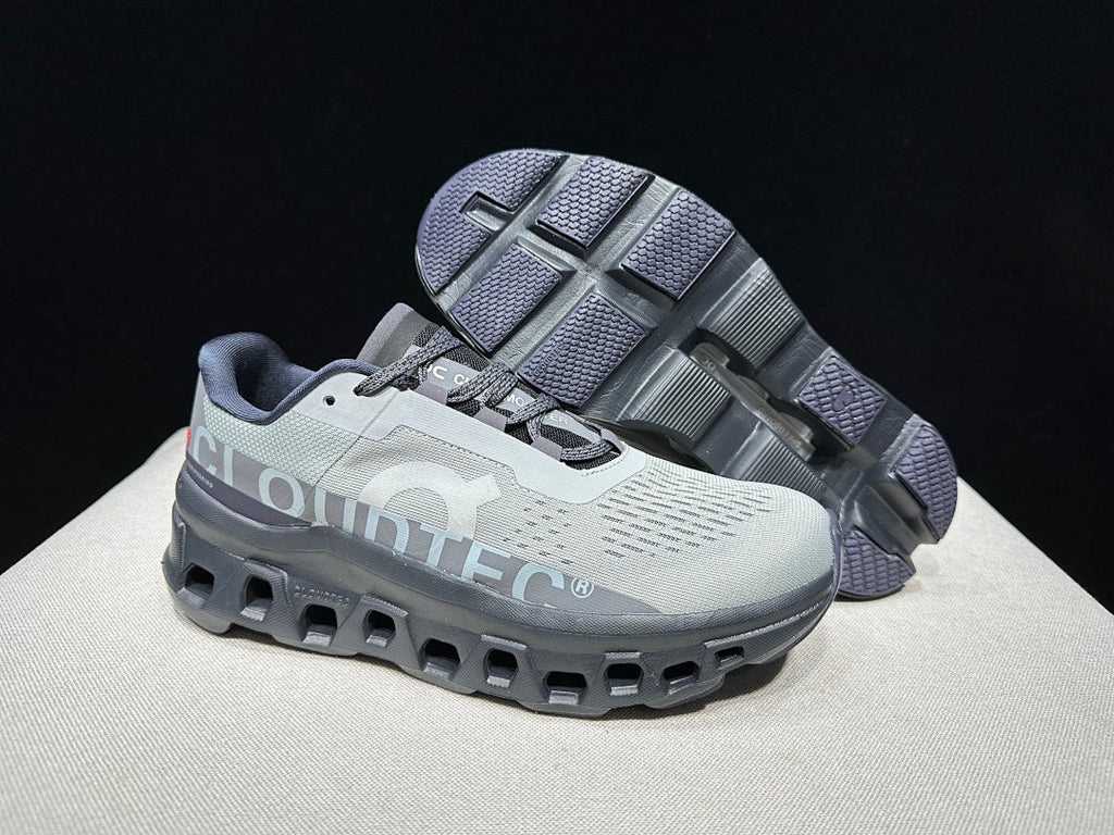 On Cloudmonster Running Shoes in Eclipse and Magnet