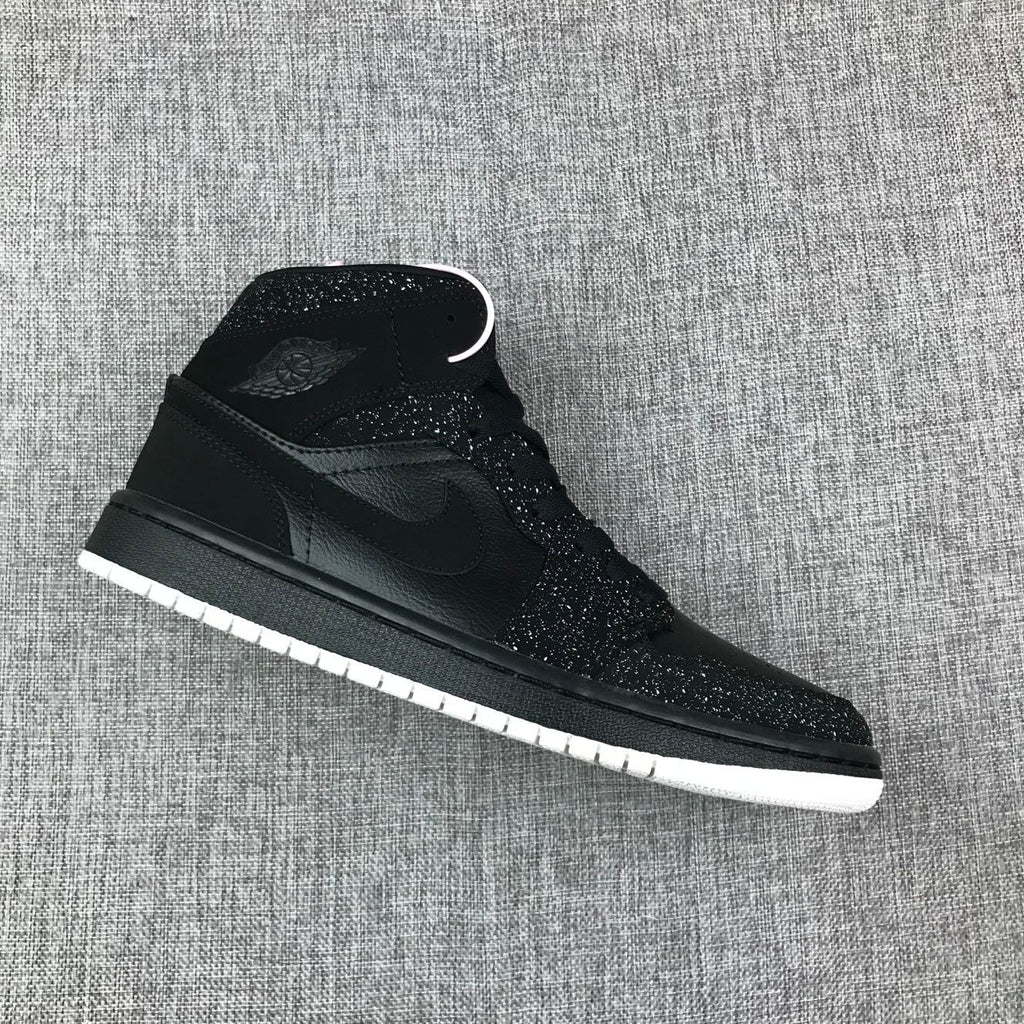 Jordan Air Jordan 1 Mid Black and White Sneakers 554724-001