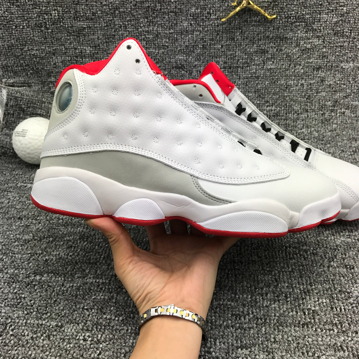 Air Jordan 13 White and Red High-Top Sneakers