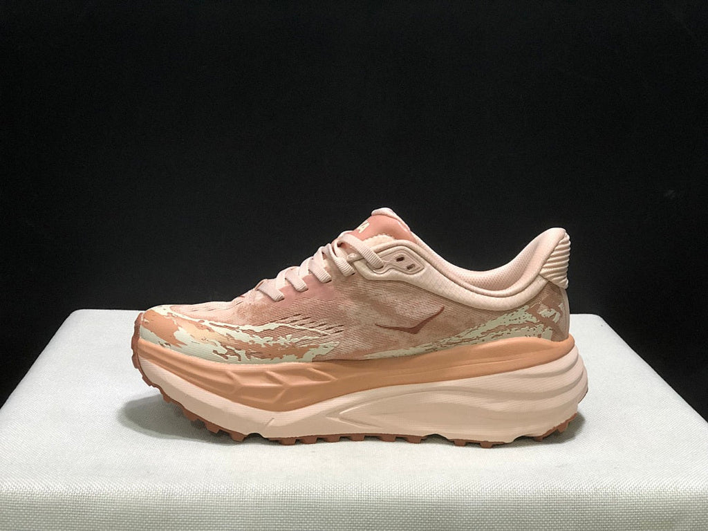 HOKA Stinson 7 Trail Running Shoes in Blush and Cream