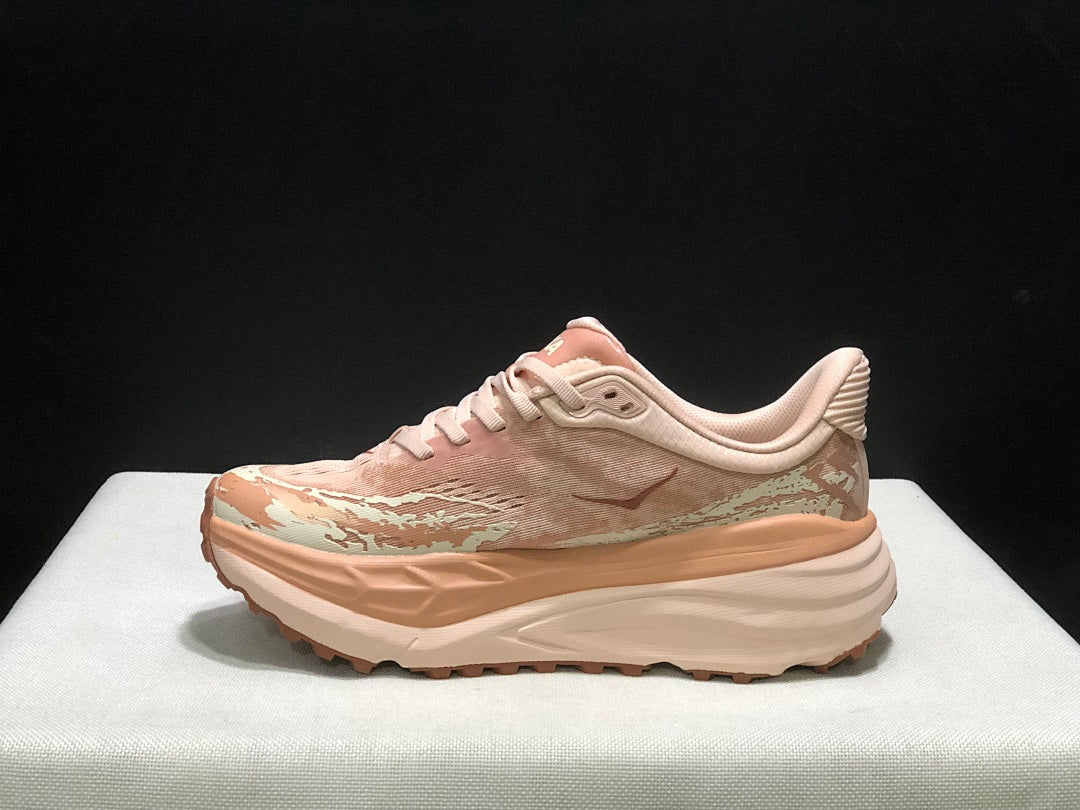 HOKA Stinson 7 Trail Running Shoes in Blush and Cream