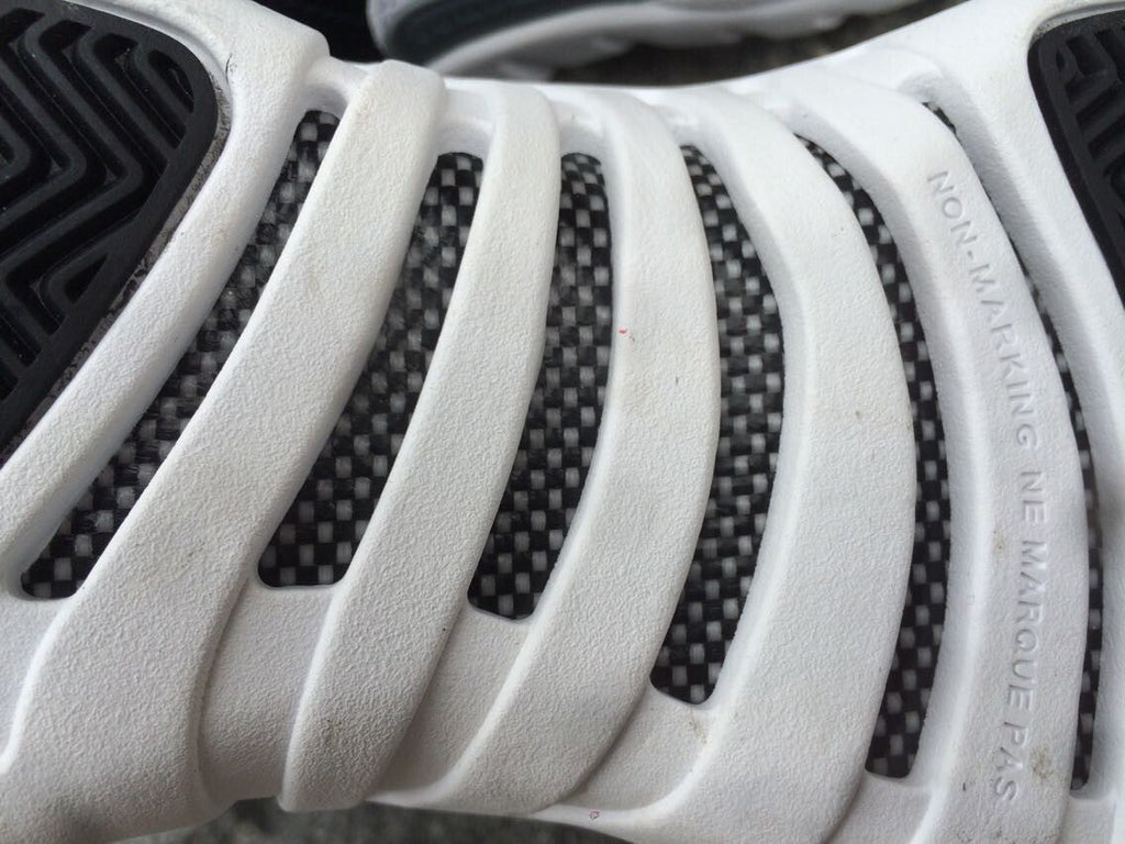 Air Jordan 12 Women's High-Top Sneakers, Black and White