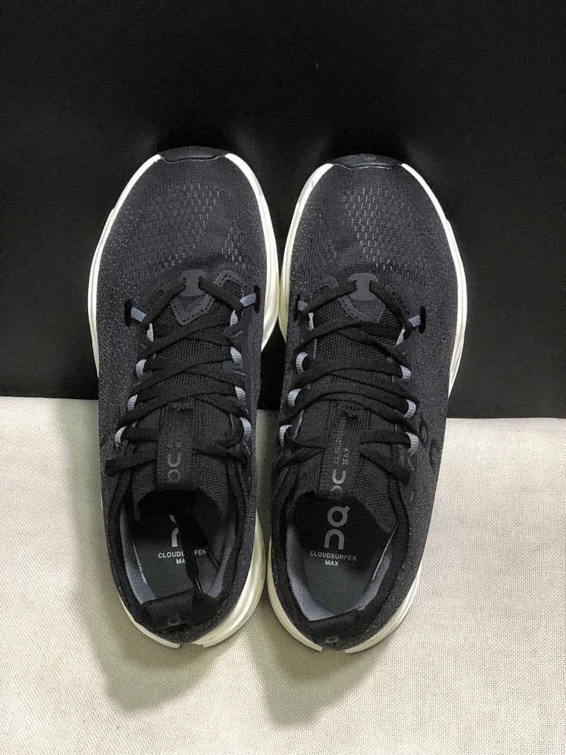 On Cloudsurfer Max Black and White Running Sneakers
