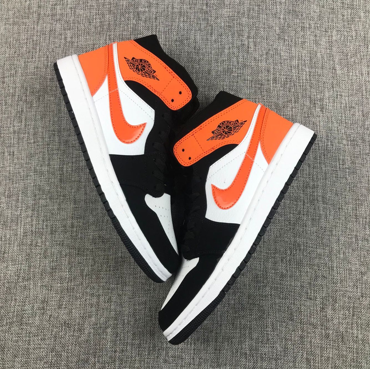 Air Jordan 1 Mid Black White Orange Sneakers 554724-058