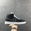 Air Jordan 1 Mid Black and White Sneakers 852542-016