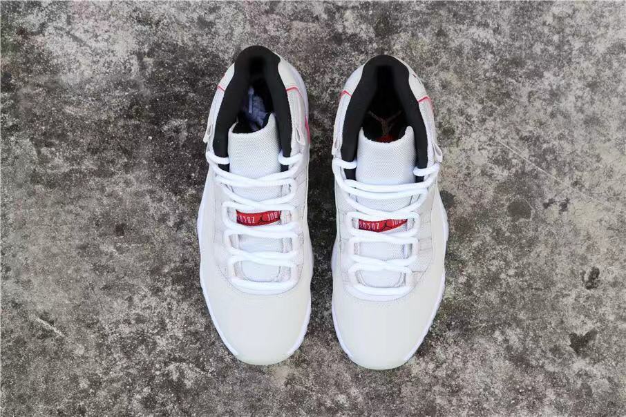 Jordan Air Jordan 11 Platinum Tint White High-Top Sneakers