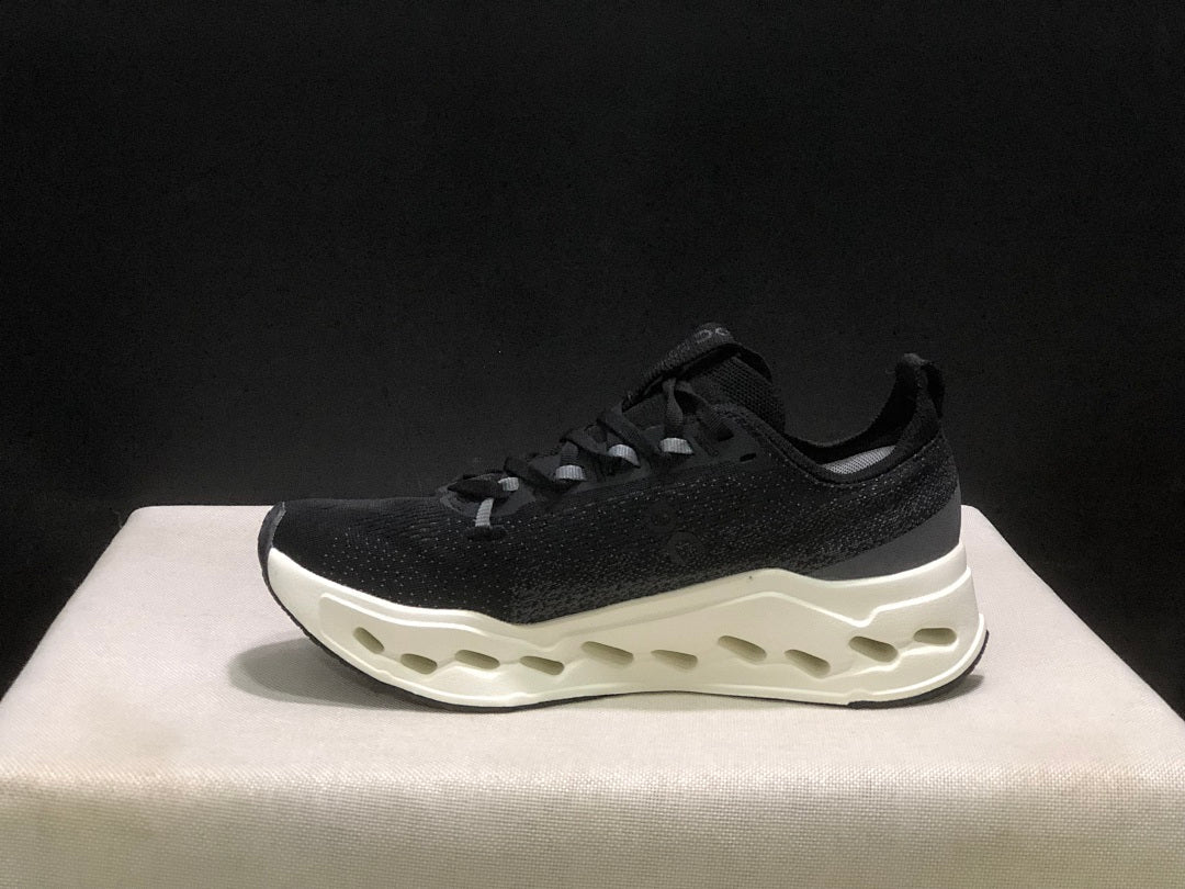 On Cloudsurfer Max Black and White Running Sneakers