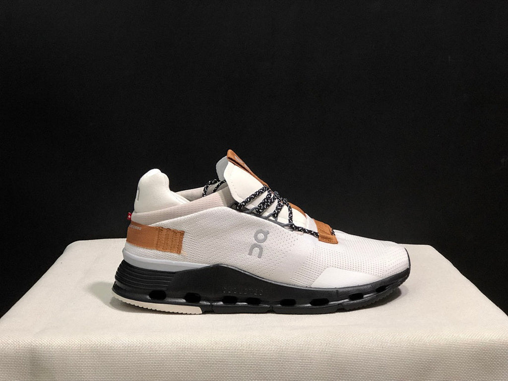 On Cloudnova Sneakers in White, Black and Tan