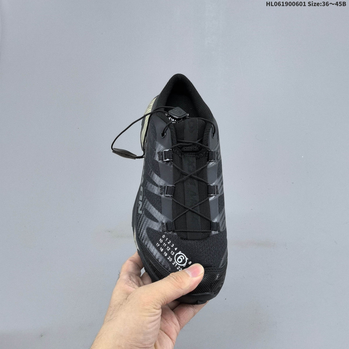 Salomon XT-4 Mule Sneakers in Black and Silver
