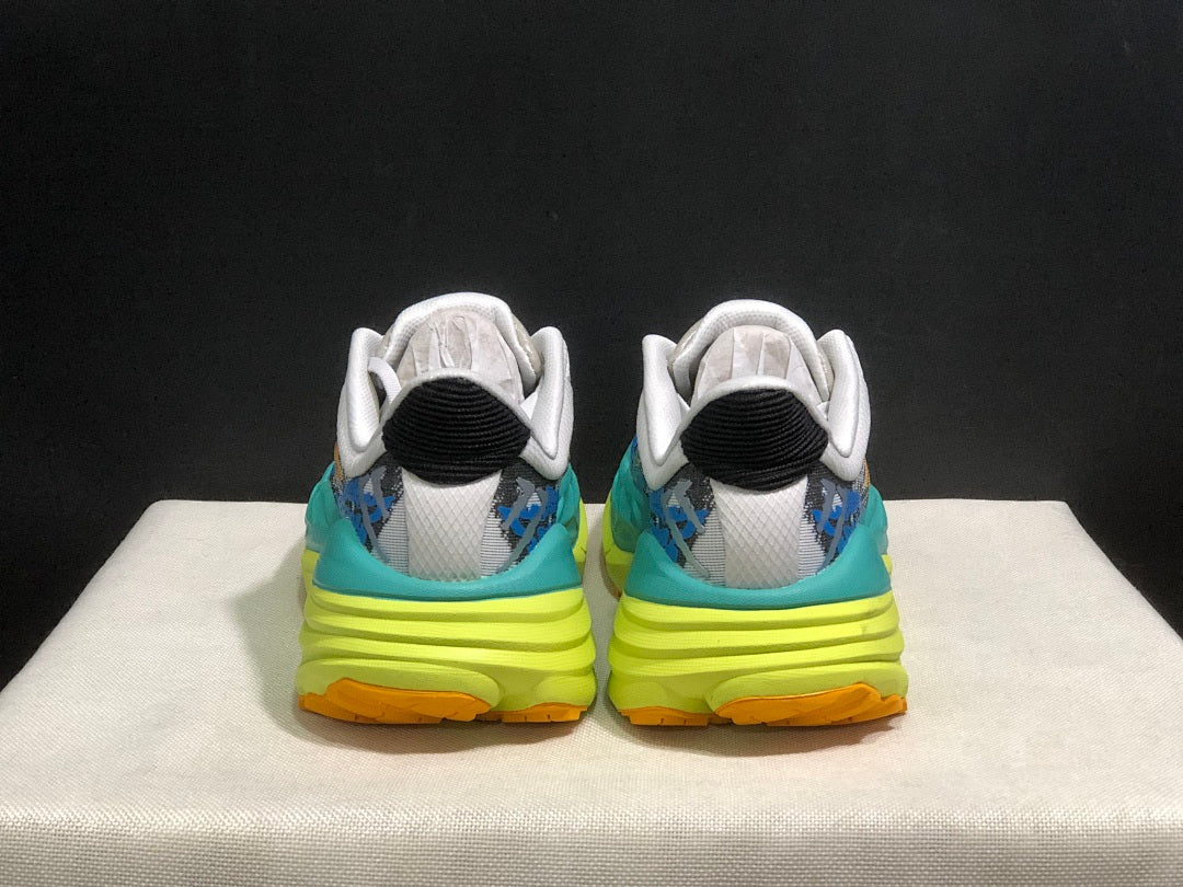 HOKA Stinson 7 Trail Sneakers in Blue and Lime